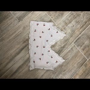 A cropped cherry spaghetti top